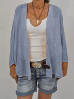 Women?ˉs Casual Solid Color Textured V Neck Loose Long Sleeve Blouse